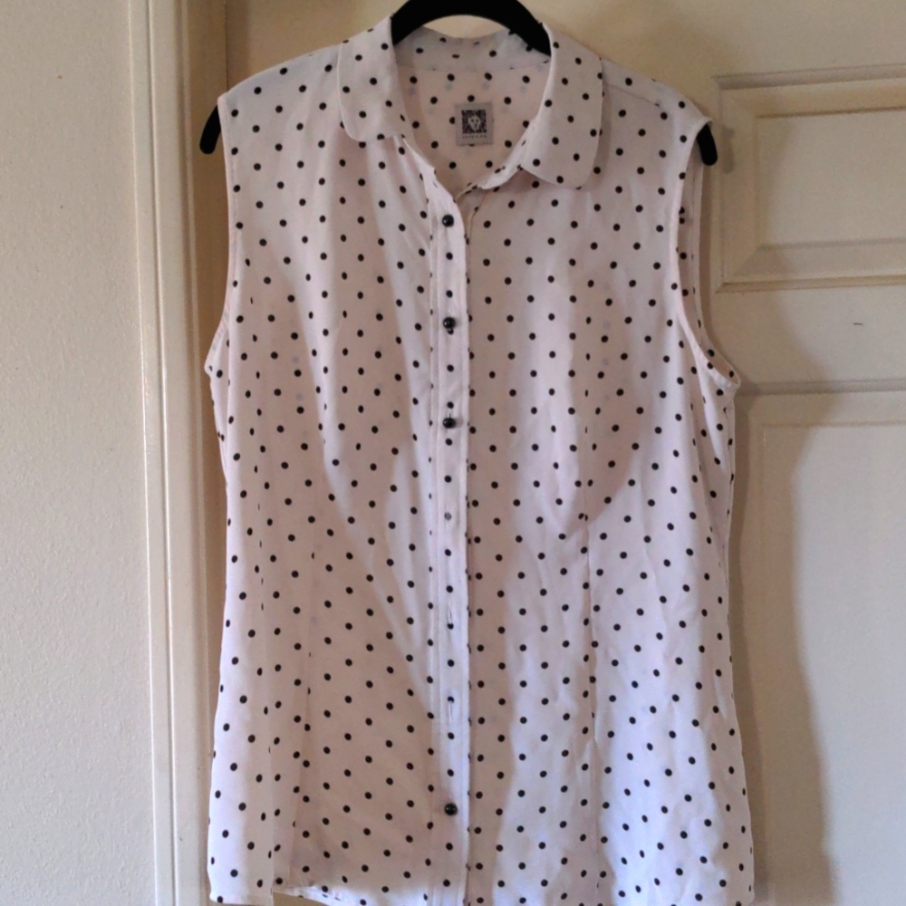 Black and white polka dot sleeveless blouse